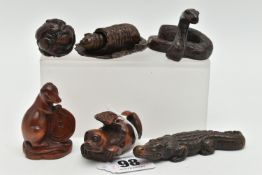 FOUR 20TH CENTURY CARVED TREEN NETSUKE AND TWO OKIMONO, carved as a variety of animals / reptiles