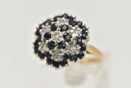 A 9CT GOLD DIAMOND AND SAPPHIRE CLUSTER RING, single cut diamond and circular cut blue sapphires,
