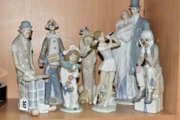 A GROUP OF NAO AND OTHER SPANISH PORCELAIN FIGURES, comprising three Nao figures: 'A Bird in Hand'