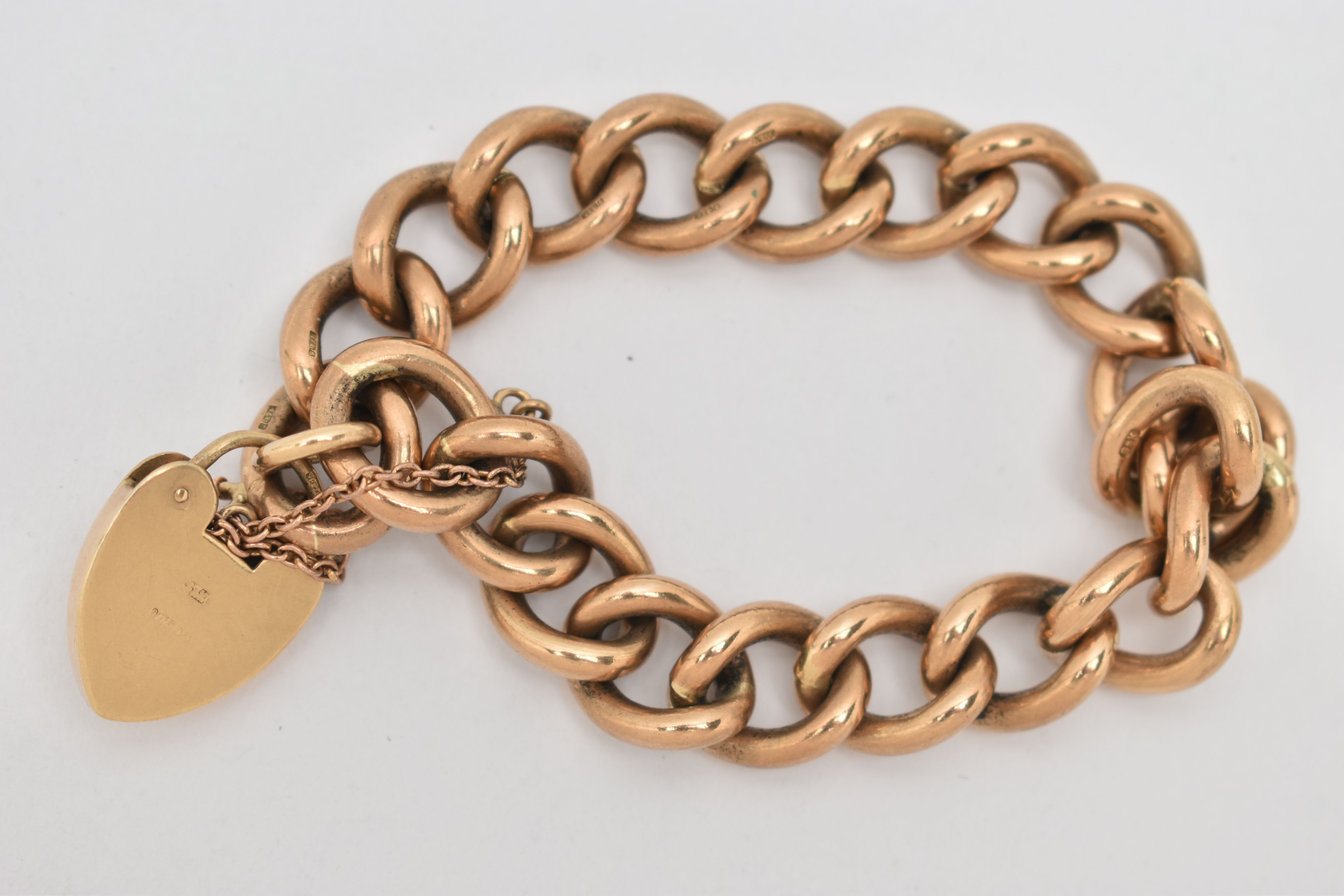 A 9CT YELLOW GOLD BRACELET WITH PADLOCK, the curb-link bracelet with hinged padlock clasp, clasp - Image 2 of 2