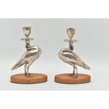 A PAIR OF 'WILLIAM HUTTON & SONS LTD' SILVER CANDLESTICKS, each in the form of a bird set with glass