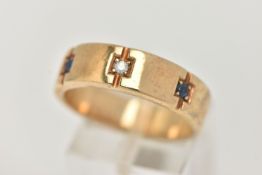 A GENTS 9CT GOLD SAPPHIRE AND DIAMOND RING, set with a central round brilliant cut diamond,