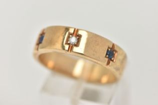 A GENTS 9CT GOLD SAPPHIRE AND DIAMOND RING, set with a central round brilliant cut diamond,