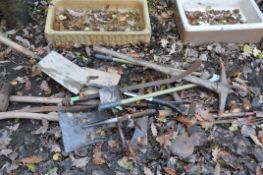 A BUNDLE OF VINTAGE HAND TOOLS, to include shovels, axe, pick axe, etc (10+)
