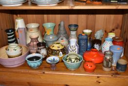 A COLLECTION OF VASES AND PLANTERS, over thirty pieces, to include a Brixham pottery posy vase, a