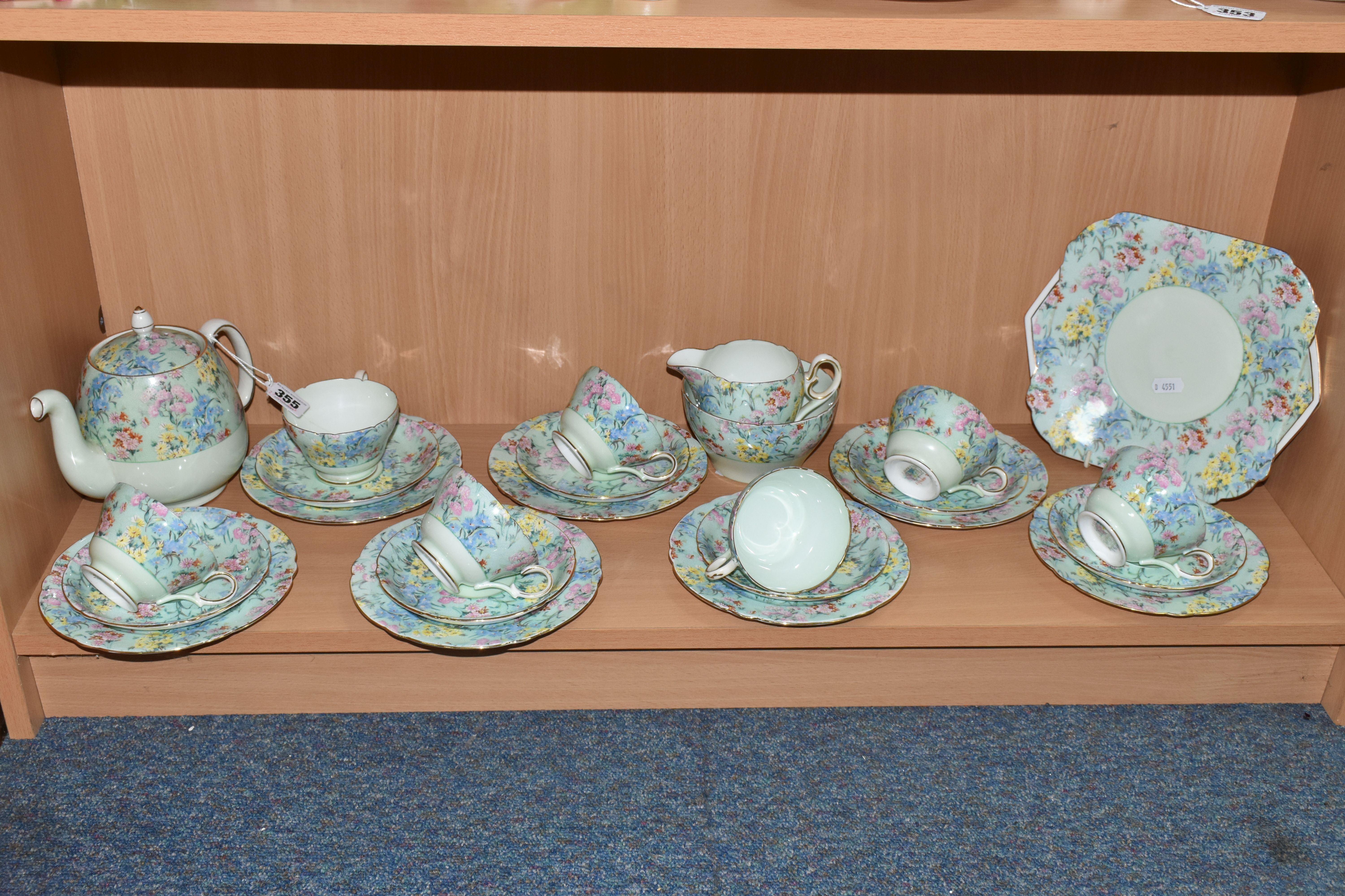 A TWENTY FIVE PIECE SHELLEY 'MELODY' TEA SET, comprising a teapot, a cake plate, a cream jug, a