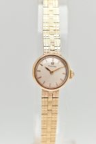 A LADIES 9CT GOLD 'OMEGA' WRISTWATCH, manual wind, round silvered dial signed 'Omega', baton