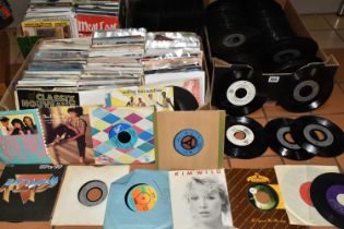 FOUR BOXES OF SINGLES RECORDS CONTAINING APPROXIMATELY EIGHT HUNDRED CUT WITH LARGE CENTRE HOLES FOR