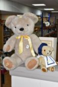 A LARGE MERRYTHOUGHT CHAMPAGNE PLUSH BEAR, plastic eyes, vertically stitched nose, jointed body,