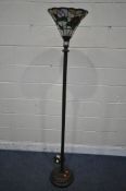 A METAL SPIRAL STANDARD LAMP, with a Tiffany style floral shade, overall height 175cm (condition