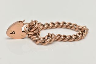 A 9CT GOLD CURB LINK BRACELET, hollow polished curb links, most stamped 9c, fitted with a heart