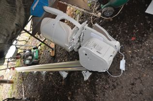 A STANNAH STAIRLIFT with power supply, seat and straight rail 423cm long. (one joint half way