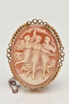 A 9CT GOLD CAMEO BROOCH, of an oval form, carved shell cameo depicting the Three Graces, collet