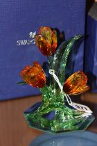 A BOXED SWAROVSKI PARADISE FLOWERS 'TULIPS' 5302530, with a mirrored stand, designed by Juan Ignacio