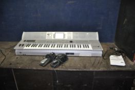 A GEM GENESYS DIGITAL KEYBOARD with two single pedals and manual (PAT pass and working) (Condition