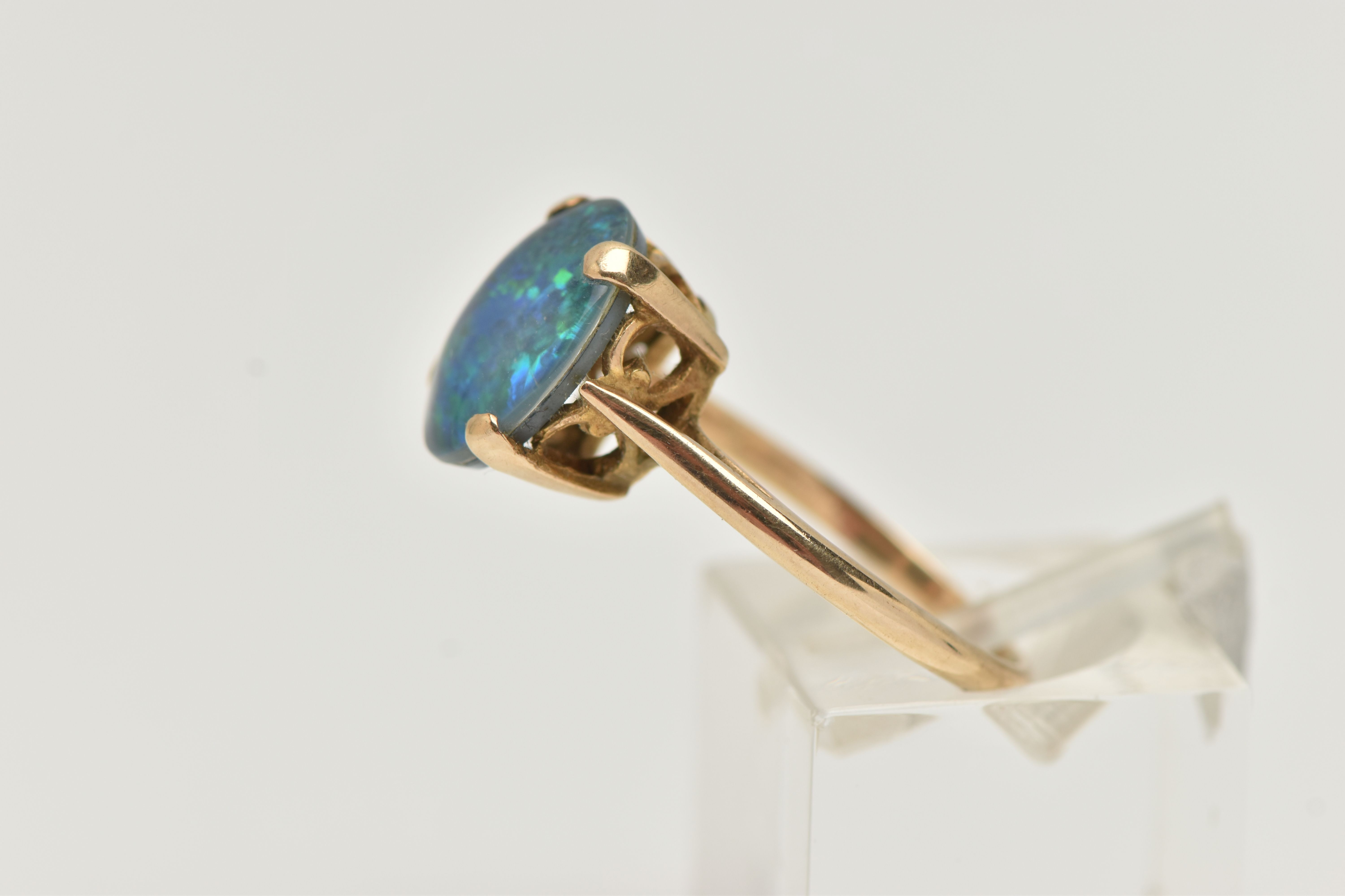 A 9CT GOLD OPAL TRIPLET RING, the oval opal triplet in a four claw setting to the plain band, 9ct - Image 2 of 4