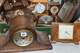 A BOX AND LOOSE CLOCKS AND BAROMETER, including a modern cuckoo clock fitted with Reuge musical