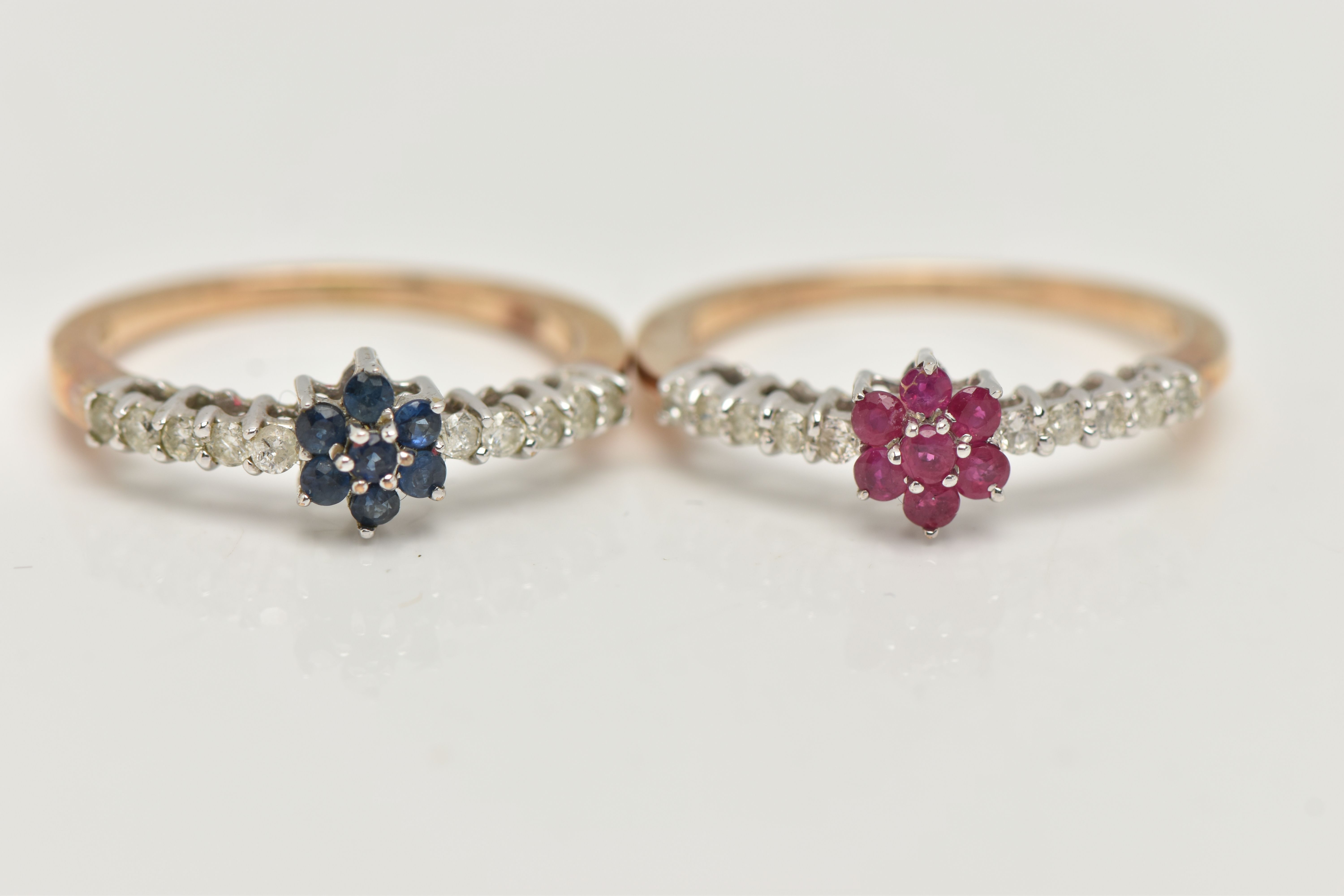 TWO 9CT GOLD GEM SET RINGS, both designed with a line of brilliant cut diamonds, the first with a
