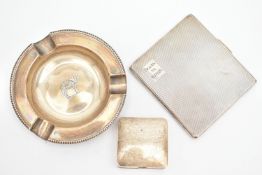THREE ITEMS OF SILVER, to include a cigarette case, of square form with engine turned pattern and