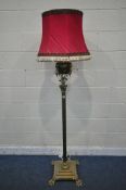 A HEAVY HINKS BRASS STANDARD LAMP, converted from a paraffin lamp, with a Corinthian pillar, on a