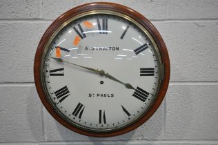 A 20TH CENTURY CIRCULAR SINGLE FUSEE WALL CLOCK, the mahogany case, a brass framed glass convex