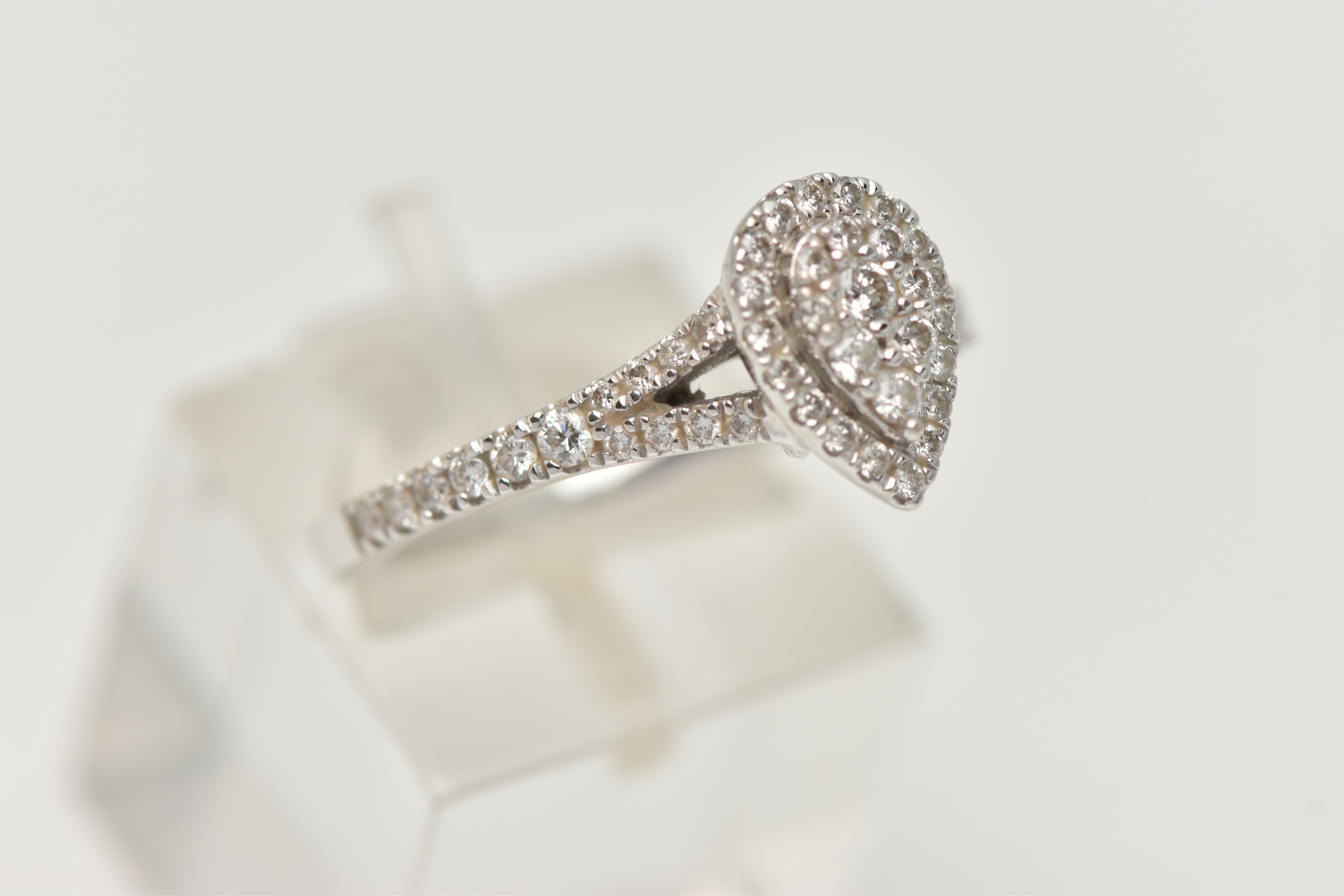 A 'VERA WANG', 18CT WHITE GOLD, DIAMOND SET RING, of a pear cut design, set with a cluster of - Image 6 of 7