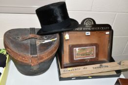 A BOXED TOP HAT from Woodrow, Manchester and a H. Upmann Cigar case with a box of fourteen Favori