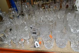 A QUANTITY OF CUT CRYSTAL, comprising a pair of Stuart Crystal 'cascade' pattern candle sticks, a