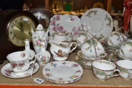 A GROUP OF TEAWARE AND TWO MANTEL CLOCKS, to include a Royal Albert Lavender Rose teacup and