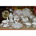 A GROUP OF TEAWARE AND TWO MANTEL CLOCKS, to include a Royal Albert Lavender Rose teacup and