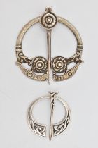TWO PENANNULAR BROOCHES, the first a silver brooch hallmarked Birmingham 1946, stamped IMC Iona,