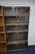 A SIMPLEX FIVE SECTION MAHOGANY STACKING BOOKCASE, all with double glazed sliding doors, one section