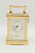A BRASS 'WOODFORD' CARRIAGE CLOCK, white dial signed 'Woodford Est.1860', Roman numerals, blue steel
