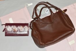 A RADLEY BROWN LEATHER PORTLAND PLACE HANDBAG AND A RADLEY BURGUNDY LEATHER WILD AT HEART PURSE,