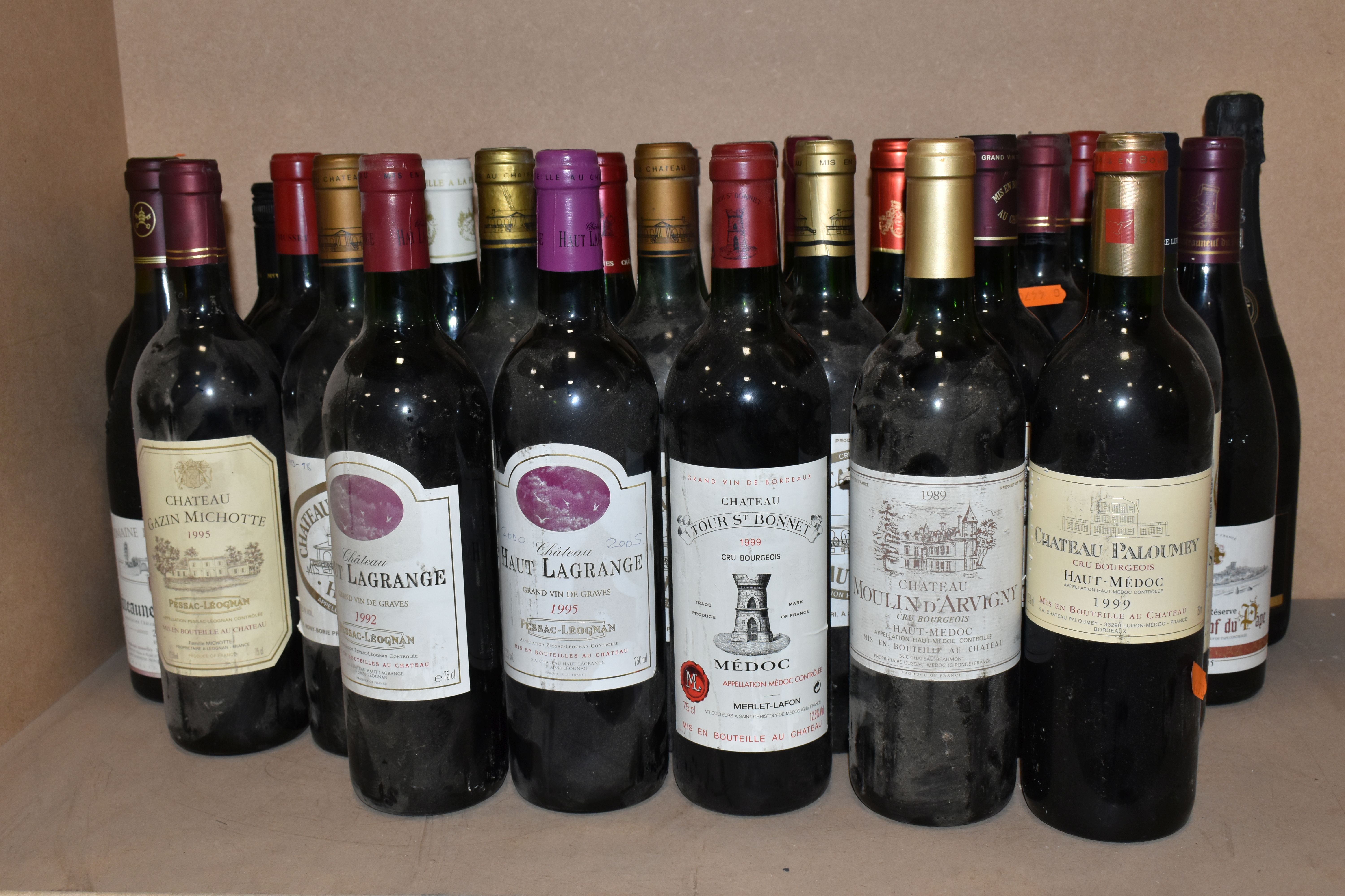 WINE, Twenty-nine bottles of assorted wine comprising one bottle of CHATEAU TOUR ST. BONNET 1999 Cru