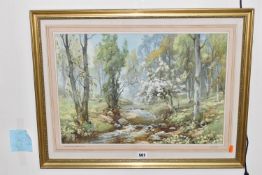 HAROLD GRESLEY (BRITISH 1892-1967) 'DOVEDALE, DERBYSHIRE', a Springtime river landscape with two