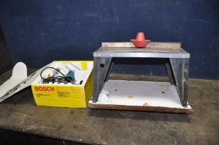 A BOSCH POF50 1/4in PLUNGE ROUTER in original box and a Amersaw router table (PAT fail dur to