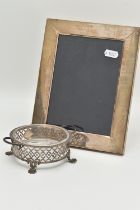 A SILVER FRAME AND BONBON DISH, the photograph frame of plain design with engraving to the lower