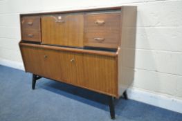 A MID CENTURY BEAUTILITY TOLA AND BLACK HIGHBOARD, fitted with two banks of two drawers, flanking