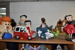FIVE CARTOON THEMED COOKIE JARS, comprising Fred Flintstone, Betty and Wilma, Tom & Jerry, Scooby