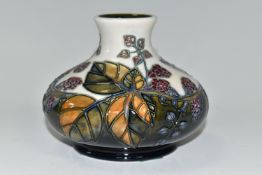 A MOORCROFT POTTERY 'BRAMBLE' VASE, of squat baluster form, having tube lined brambles and berries