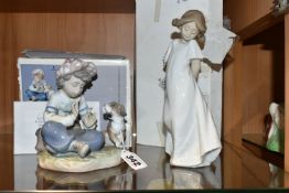 A BOXED LLADRO FIGURINE 'I HOPE SHE DOES', model 5450 depicting young boy pulling petals off flower,