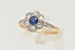 A YELLOW METAL SAPPHIRE AND DIAMOND CLUSTER RING, flower cluster set with a central deep blue,