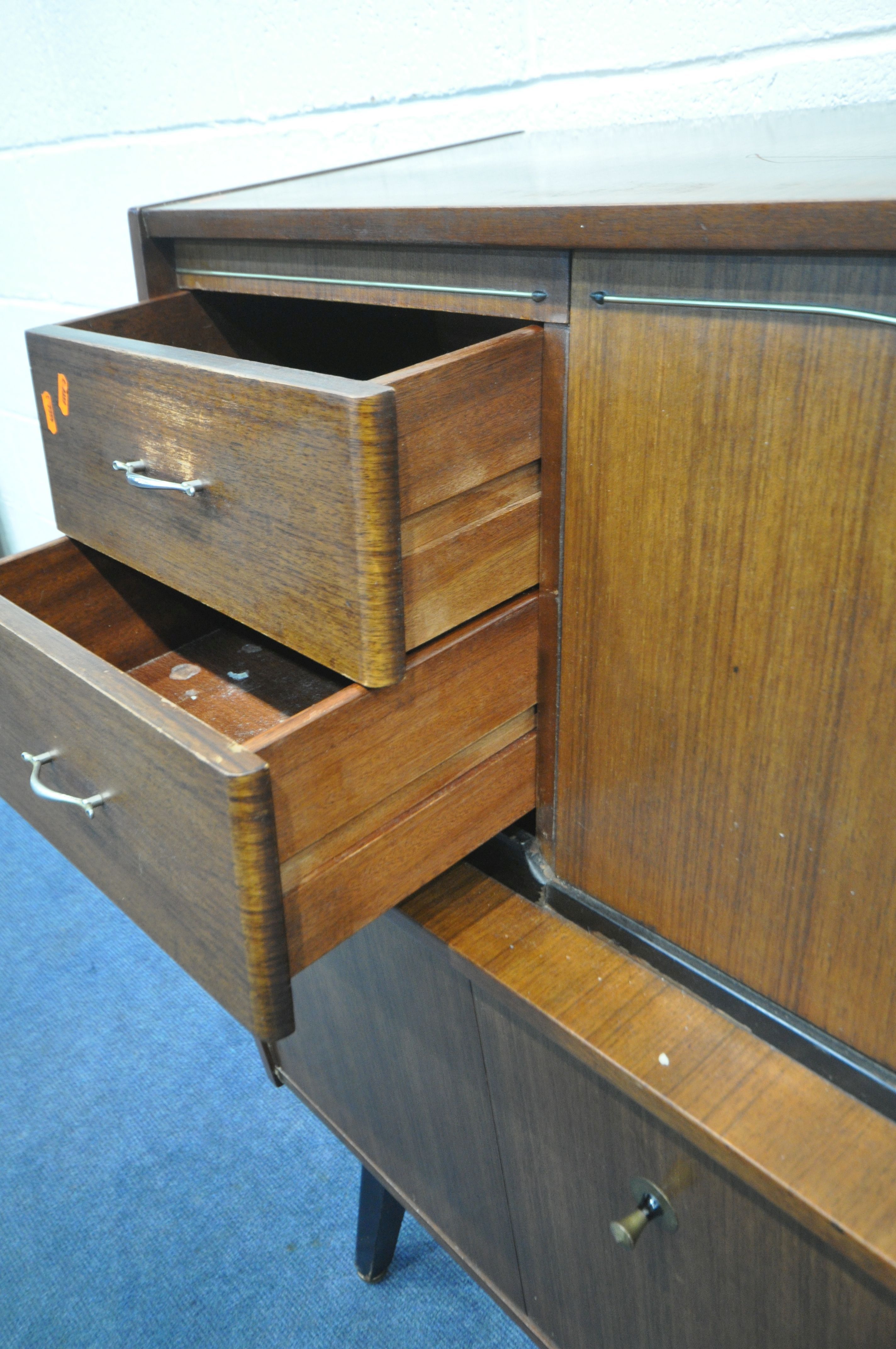 A MID CENTURY BEAUTILITY TOLA AND BLACK HIGHBOARD, fitted with two banks of two drawers, flanking - Image 2 of 8