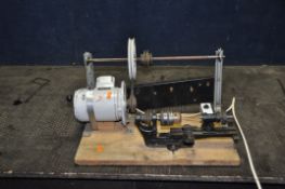A VINTAGE ADEPT WATCH MAKERS LATHE mounted with a variable speed and direction motor (PAT pass and