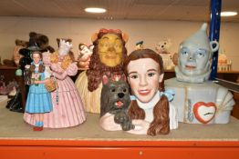 FIVE WIZARD OF OZ THEMED COOKIE JARS, comprising Dorothy and Toto, marked 'Designed exclusively