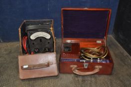 A VINTAGE AVOMETER in a distressed leather case with probes along with a VioRay scientific machine