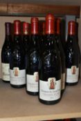 TWELVE BOTTLES OF CHATEAUNEUF-DU-PAPE comprising eight bottles of Domaine du Grand Tinel 2005, 15%
