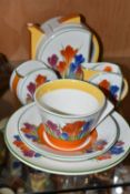 A SIX PIECE BRADFORD EXCHANGE 'CLARICE CLIFF' PART TEA FOR TWO SET, after Clarice Cliff's 'Crocus'