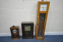 A MID CENTURY BEECH CASED GENTS OF LEICESTER CLOCK, with pendulum and instruction manual, width 29cm